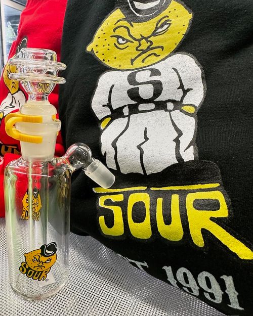 A couple of bottles sitting on top of a bed